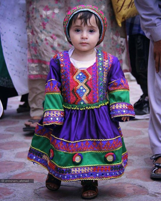 Afghan Women all over the world start online trend posing in beautiful Traditional clothes to protest against Taliban