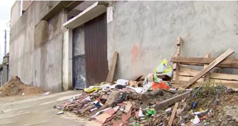Body of missing woman found buried in a concrete wall beneath a staircase