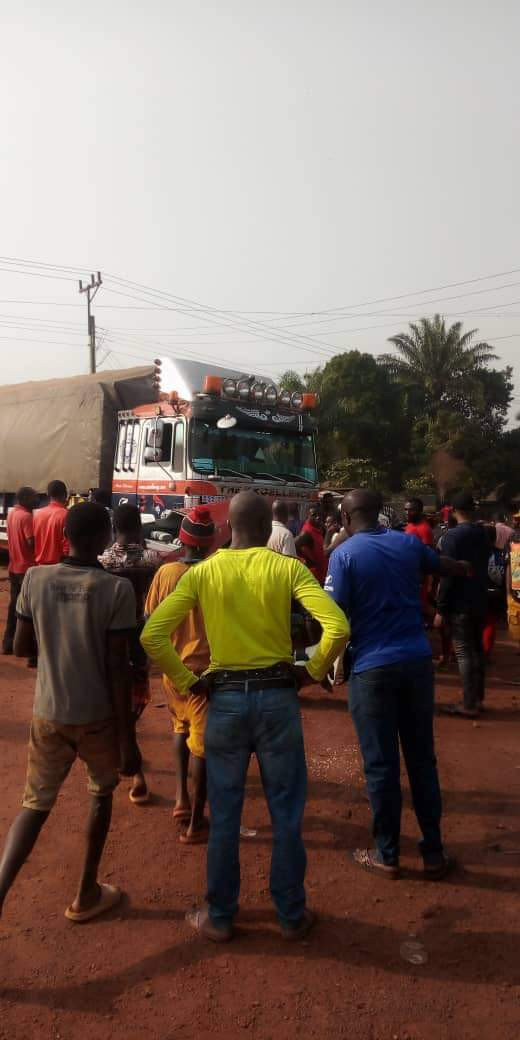 Three siblings emerge alive after a trailer crushed their car in Nsukka