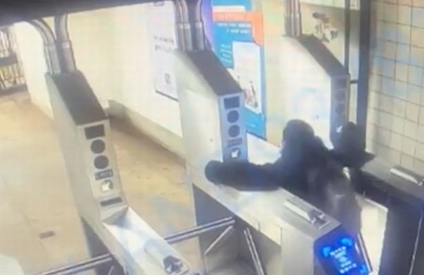 Man dies after snapping neck while trying to jump subway station turnstiles in sickening CCTV