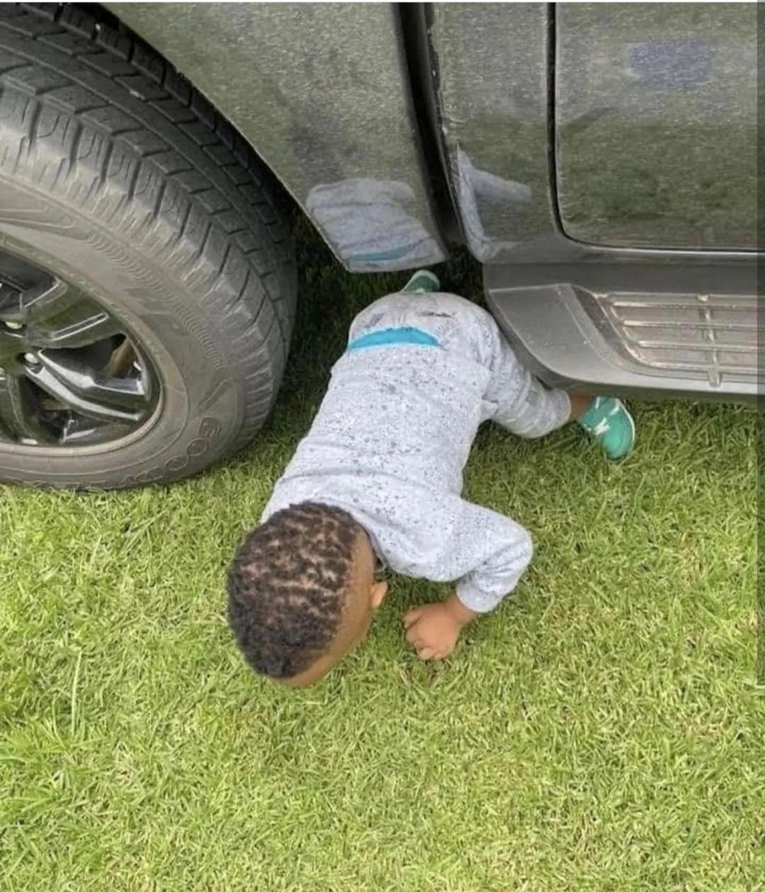 Tragedy averted as father almost crushes his son who was hiding under his car